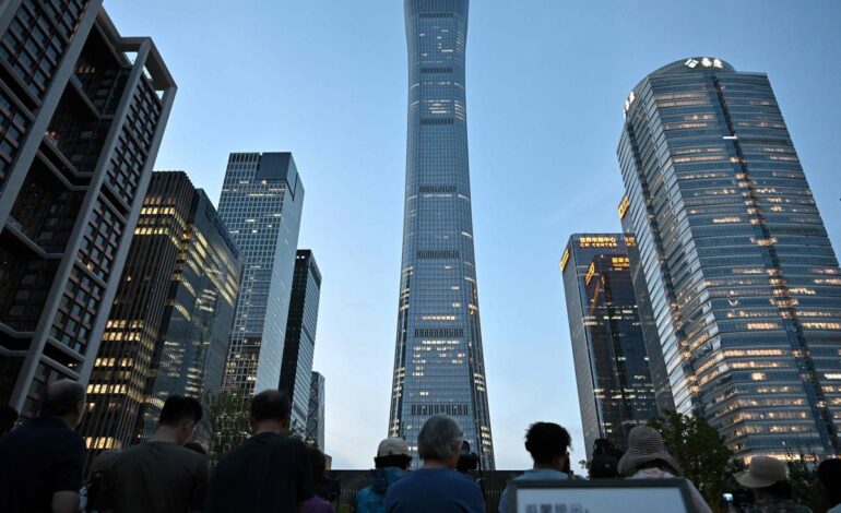 Fragments fall after an aircraft hits Beijing’s tallest building. 