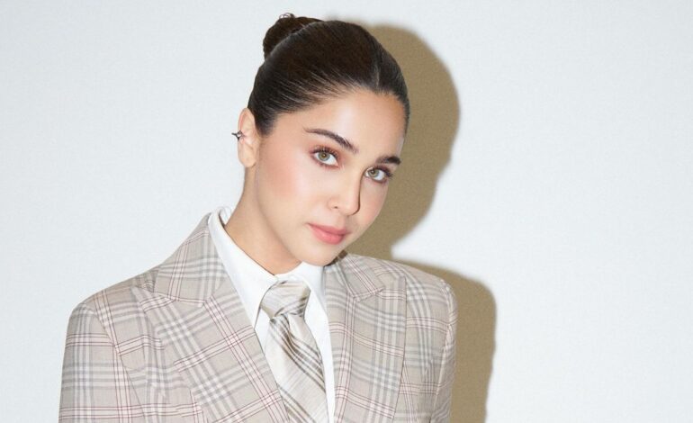 Sharvari paired a structured blazer with statement high-waist flare leg pants