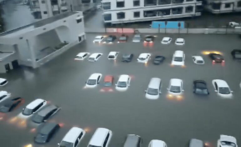 Watch: Gujarat rains trigger waist-deep flooding, vehicles go under | India News