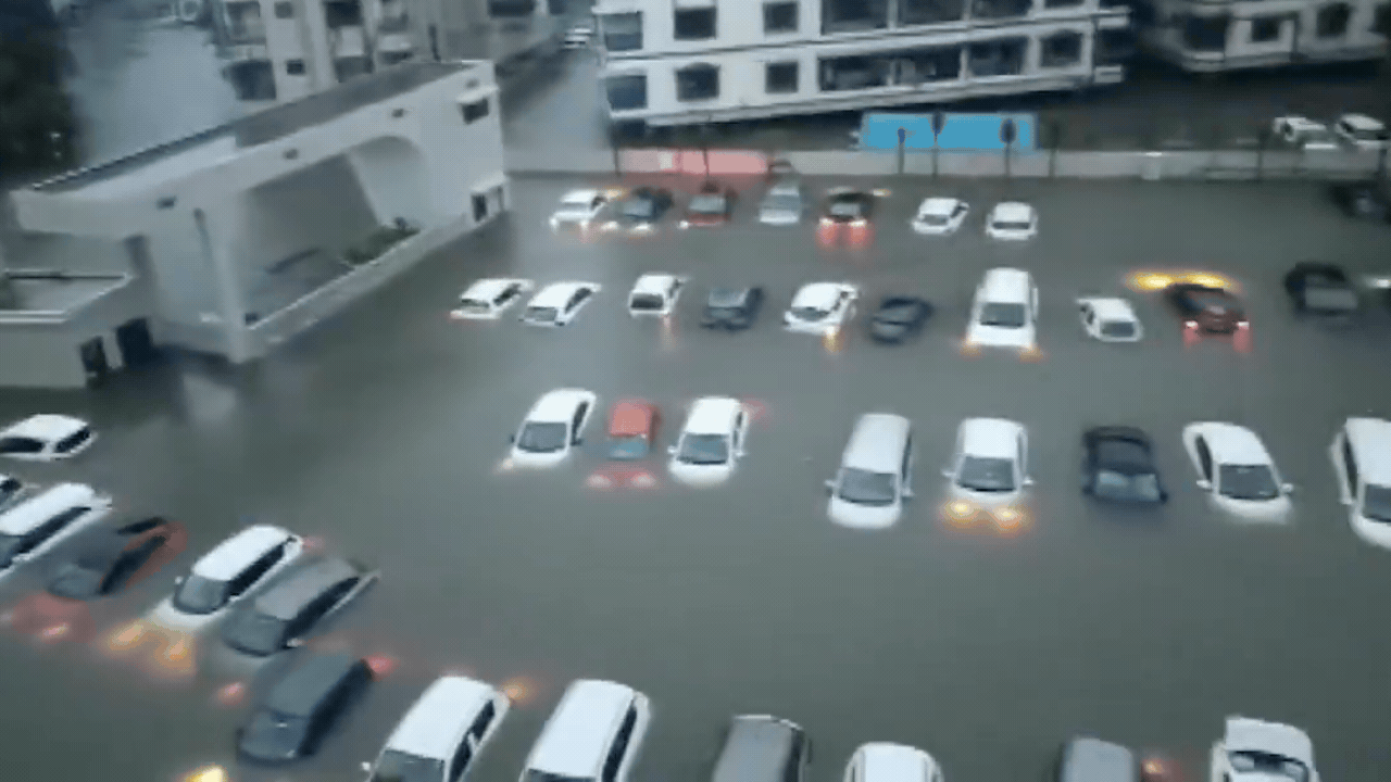Watch: Gujarat rains trigger waist-deep flooding, vehicles go under | India News