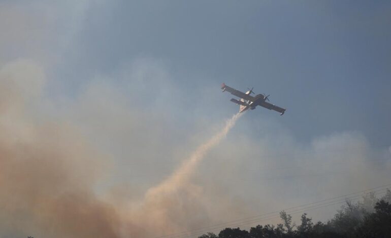 Thousands flee raging wildfires in southern Europe