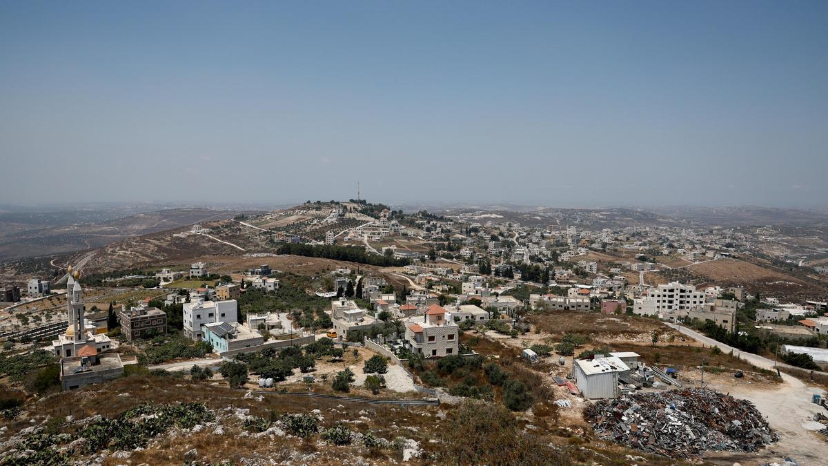 Israeli troops round up Palestinians in West Bank village after shootout involving settlers