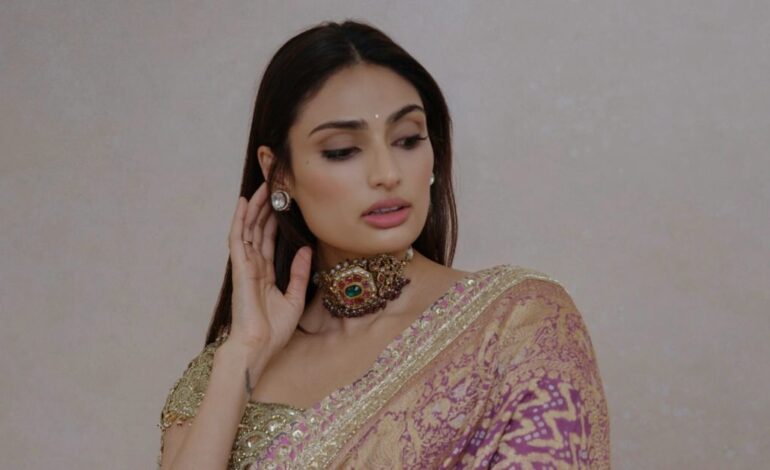 Athiya Shetty’s Manish Malhotra sari reimagines Radha-Krishna iconography in the woven form