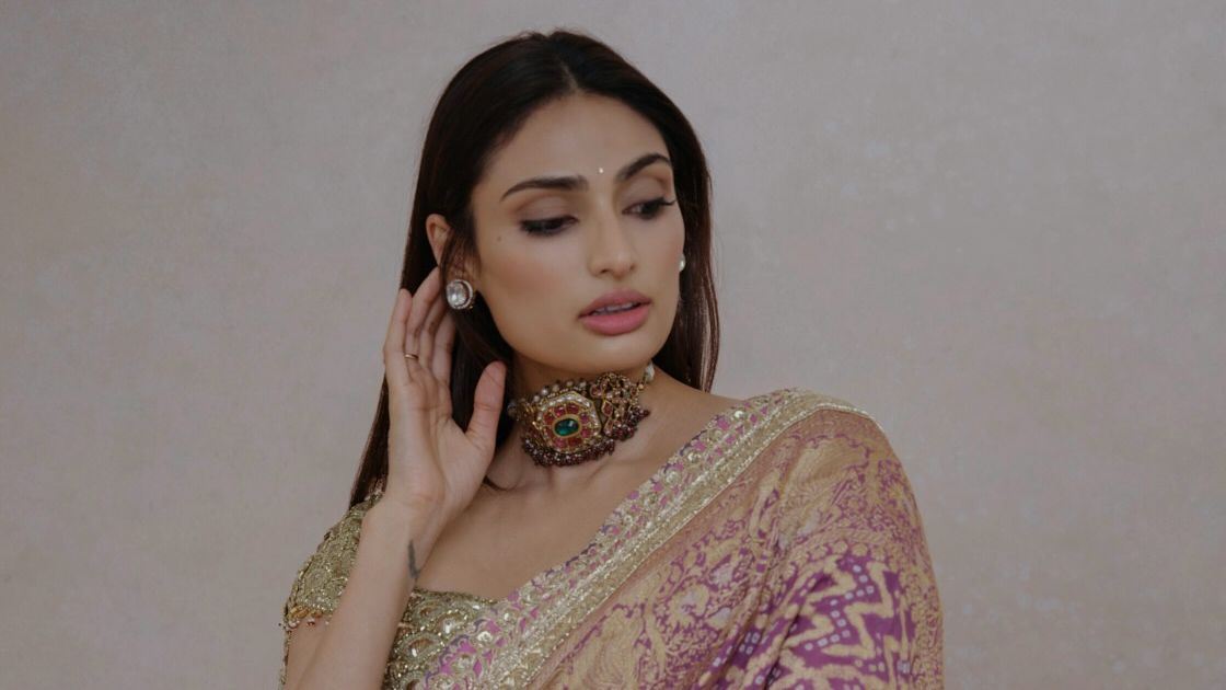 Athiya Shetty’s Manish Malhotra sari reimagines Radha-Krishna iconography in the woven form
