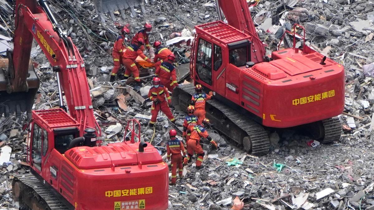 ‘No signs of life’ as China landslip toll rises to 14