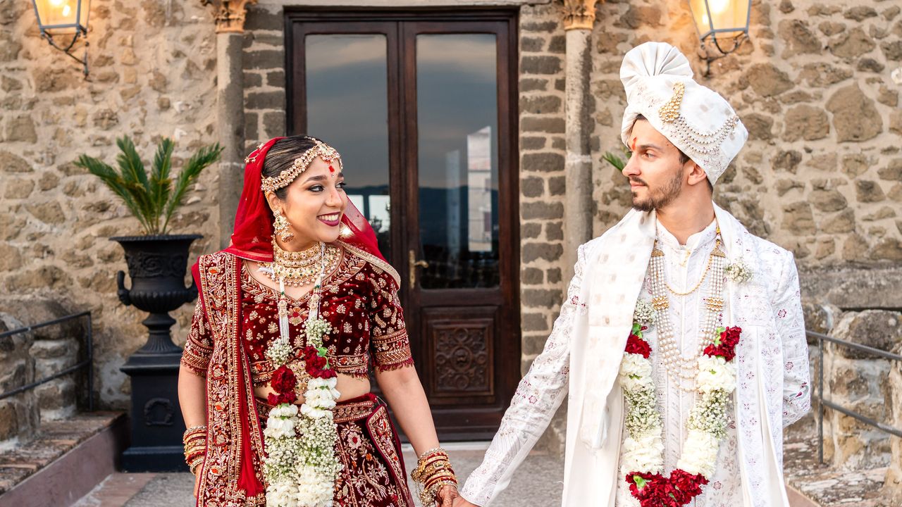 This 50-person intimate wedding brought Gujarati and Romanian traditions together at an Italian castle