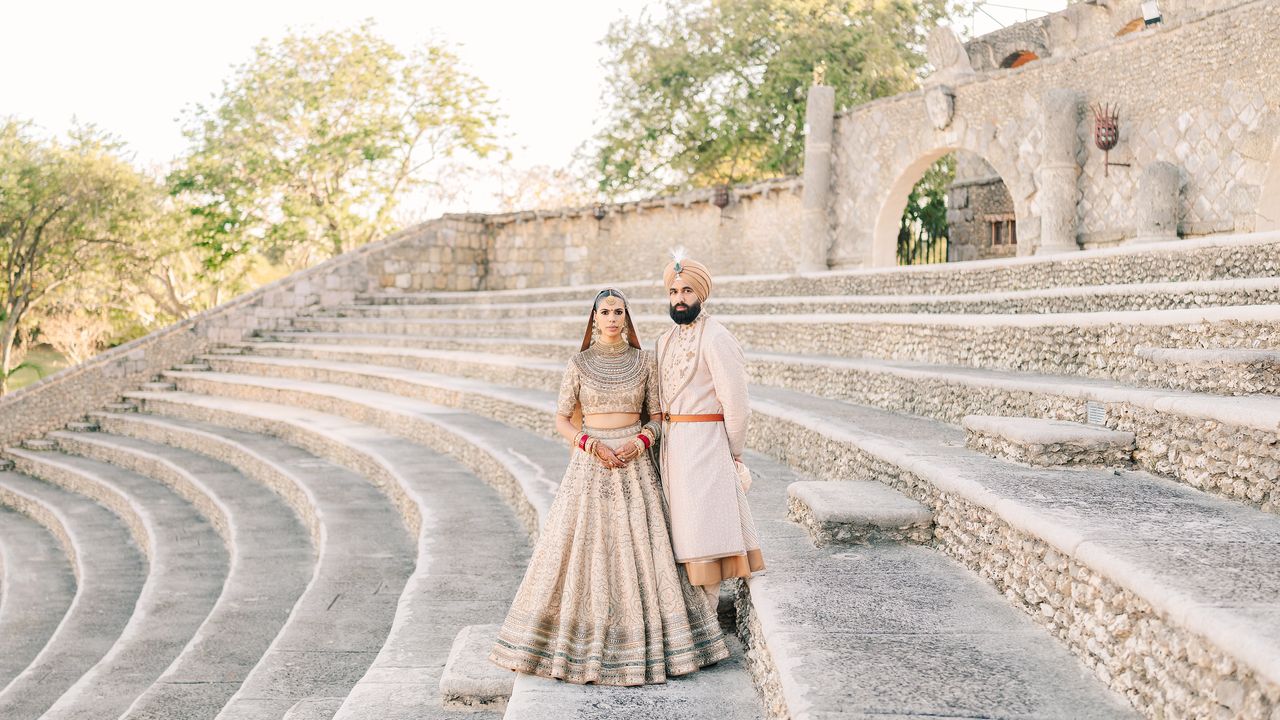 This wedding in the Dominican Republic had a nine-foot floral peacock and a Punjabi bazaar