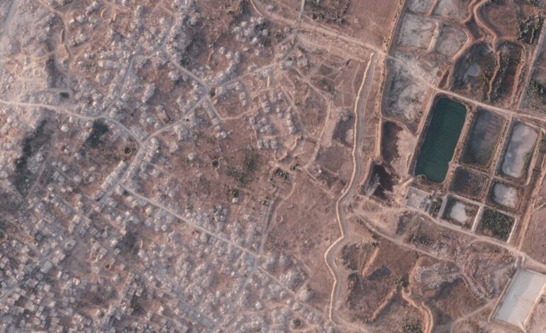 Israel is building a miles-long earthen barrier inside Gaza, entrenching its division