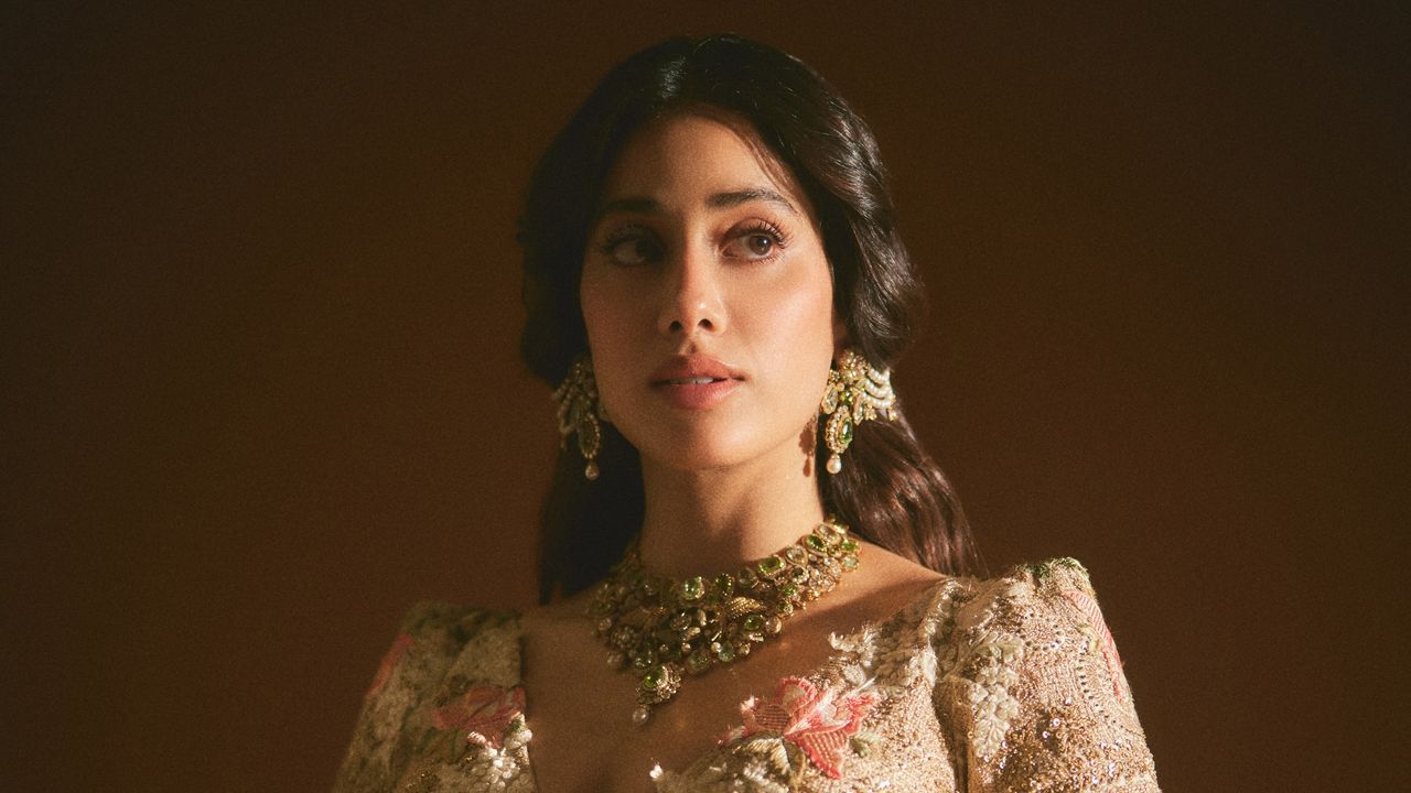 Janhvi Kapoor’s Anamika Khanna lehenga for Anshula Kapoor’s wedding ceremony was detailed with pink and green floral appliqué