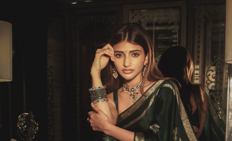 Sreeleela’s green silk sari is inundated with woven gold peacock buttas