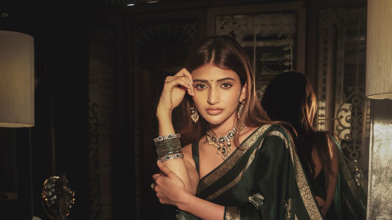 Sreeleela’s green silk sari is inundated with woven gold peacock buttas