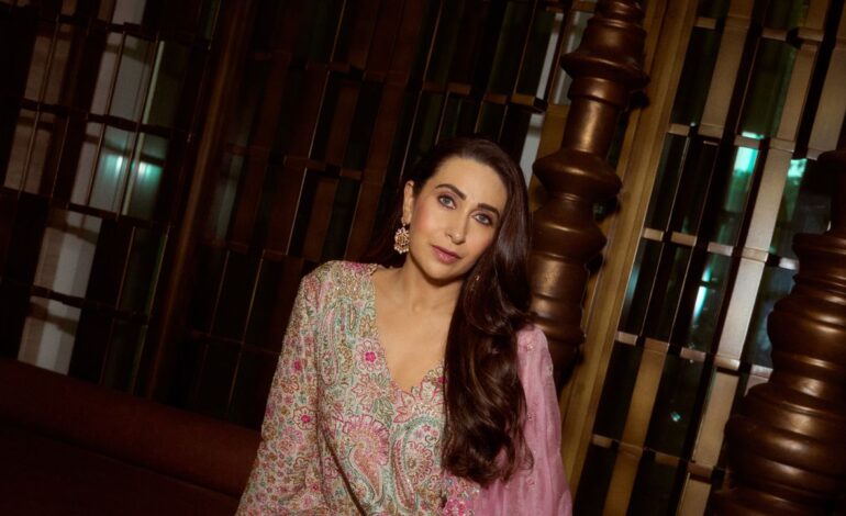 Karisma Kapoor’s silk kurta is embroidered with colourful resham threads and intricate zardozi