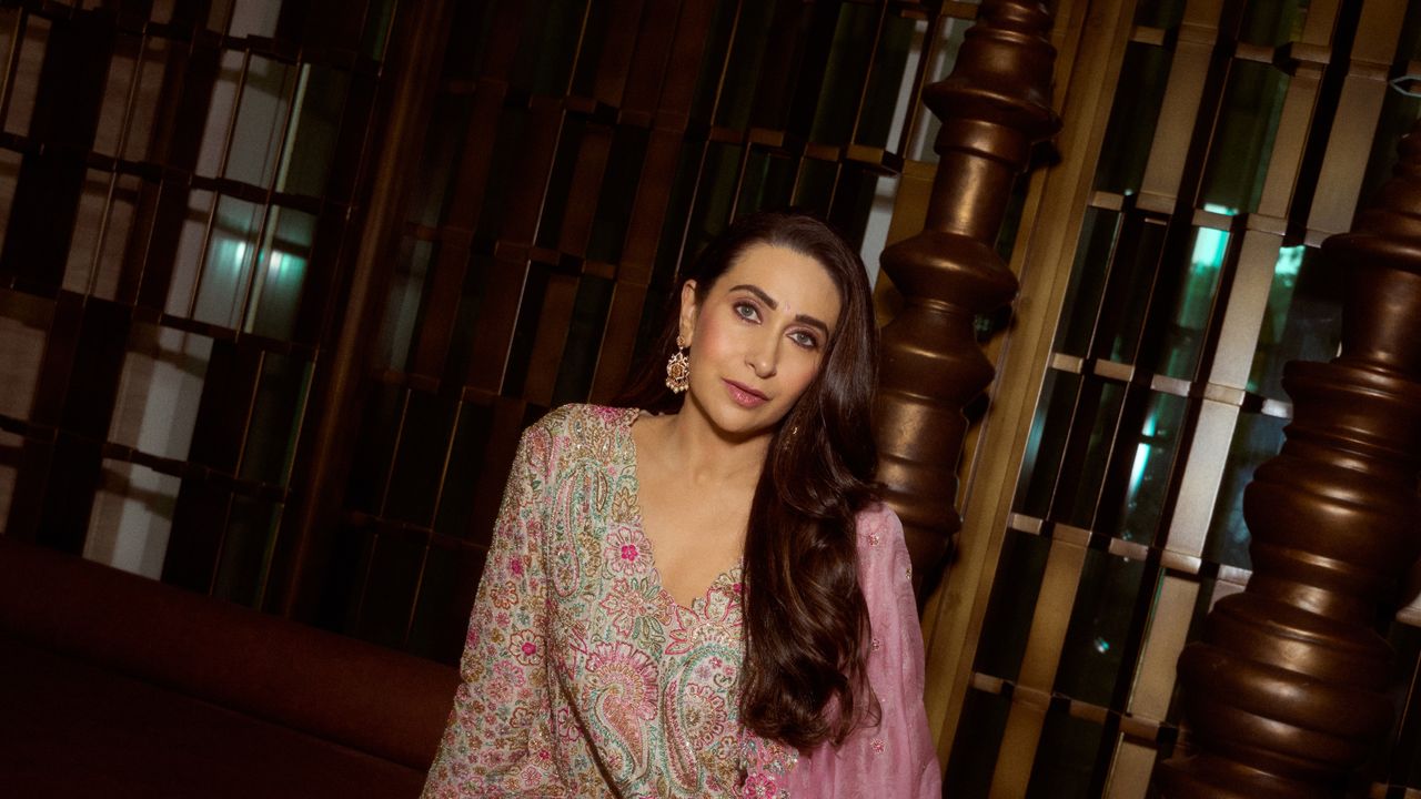 Karisma Kapoor’s silk kurta is embroidered with colourful resham threads and intricate zardozi