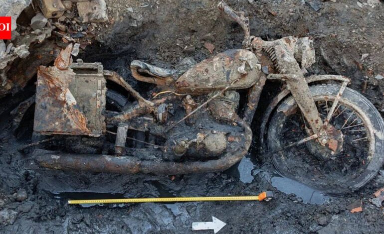 Budapest’s low Danube exposed two German soldiers and a DKW military motorcycle; mud mixed with gas oil preserved identity discs after around 80 years