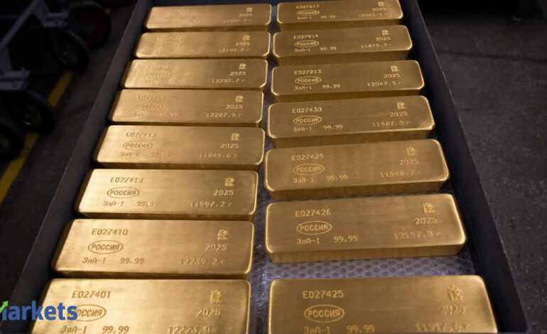 Gold edges higher near two-month peak ahead of US inflation data
