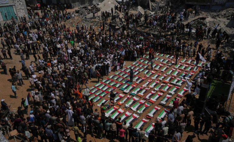 Palestinians hold mass funeral for 112 bodies finally recovered from a 2023 Gaza strike