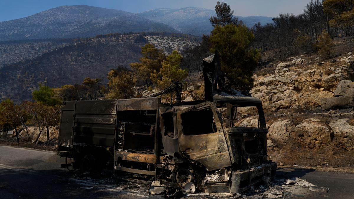 Greek Mayor among three charged over wildfire near Athens