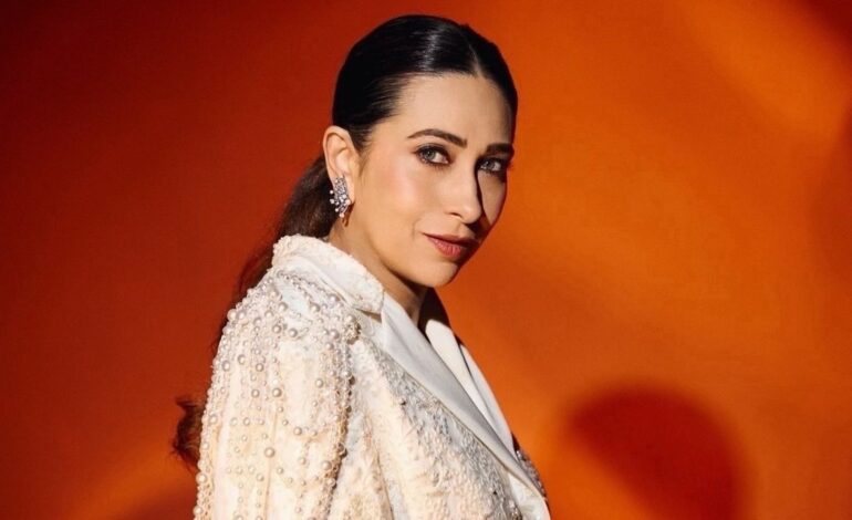 Karisma Kapoor wore a Manish Malhotra blazer look embroidered with pearls and lace