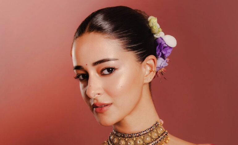 Ananya Panday wore Manish Malhotra’s royal blue Paithani sari with peacock buttis in zari and zardozi borders