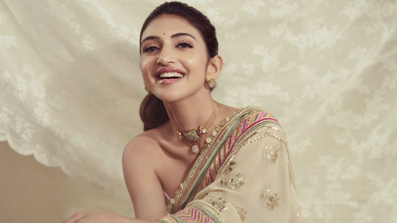 Sreeleela’s sari reimagines the classic style with a fish-cut silhouette and gota patti