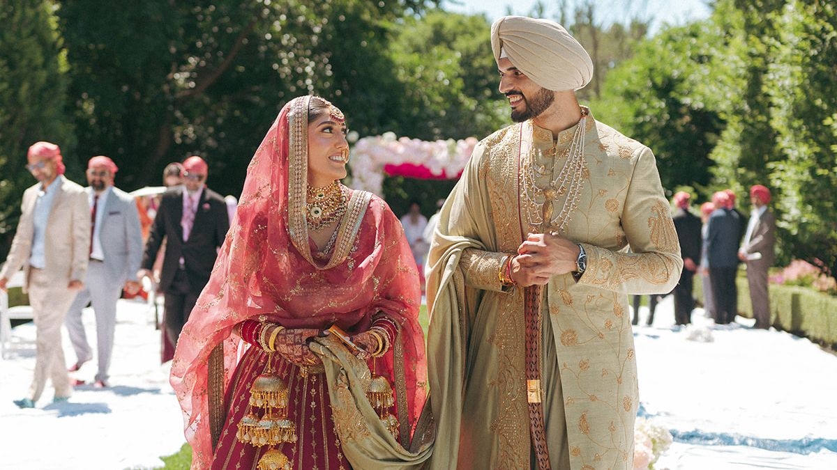 From Manish Malhotra’s gold Banarasi silk to Abhinav Mishra’s mirror work, this bride’s wedding wardrobe celebrated Indian craft