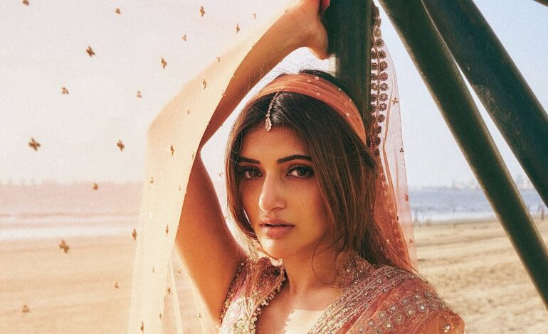 Sreeleela’s pink lehenga features intricate aari and zari work, crafted over 600 hours